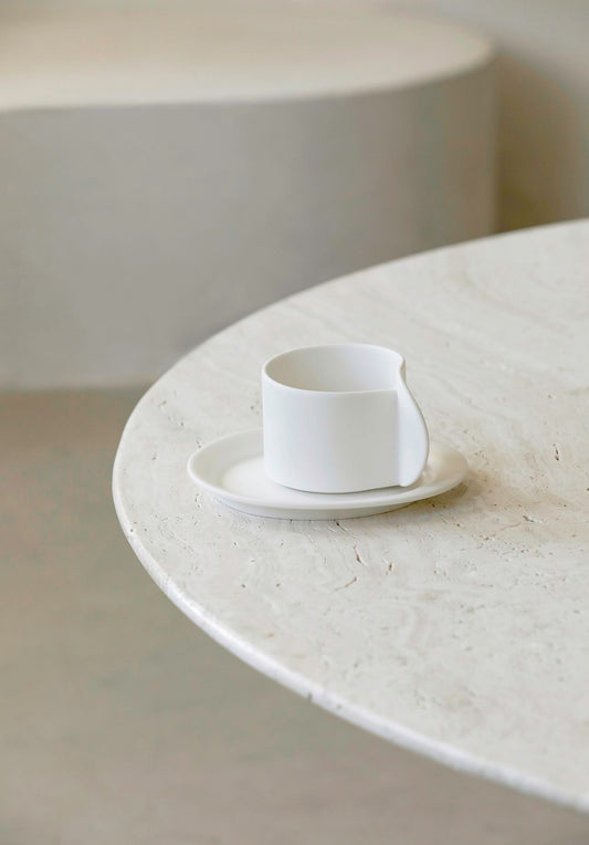 Elevate your tea moments with the ARCHIVE Suomo series artisanal kitchenware - a stunning White Mini Cup and Saucer set that combines elegance and functionality.