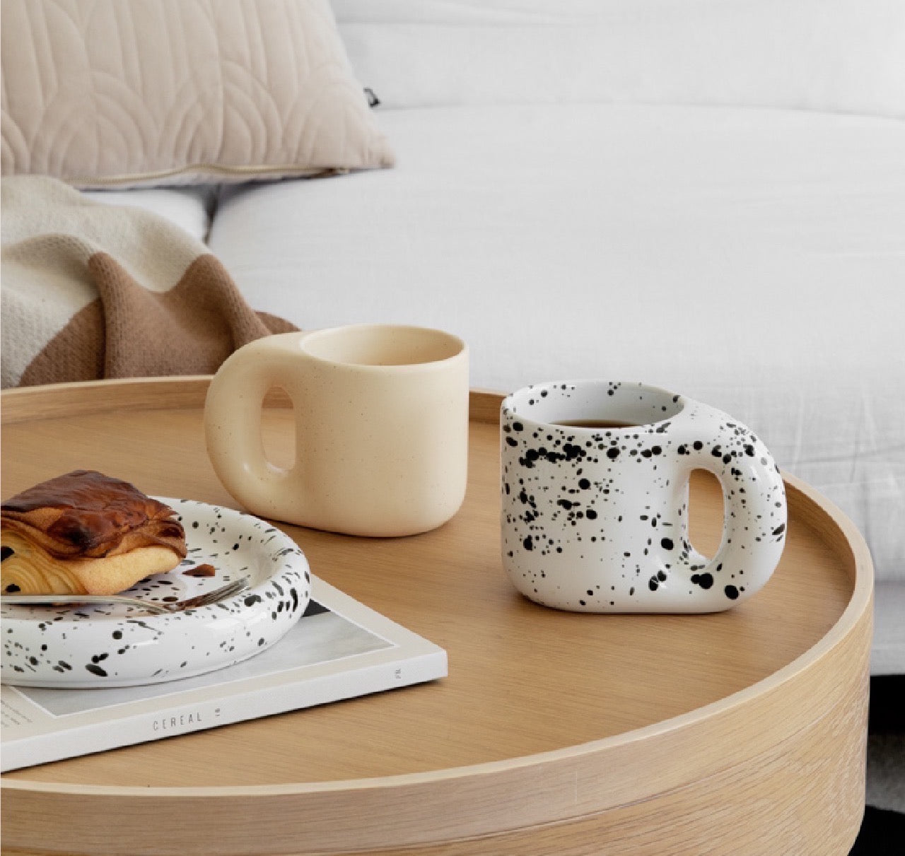 Experience the charm of funky artisanal coffee mugs, reminiscent of a Parisian breakfast, available at ARCHIVE. Elevate your morning routine with this exquisite collection of artisanal kitchenware.